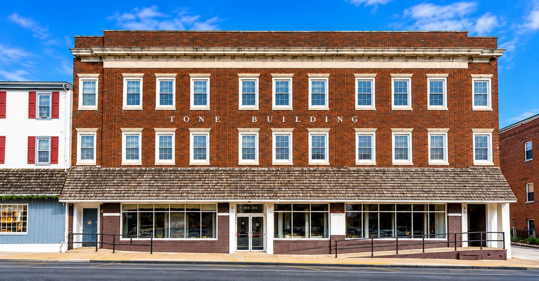 Four-story brick commercial building on Main Street in Norristown, PA